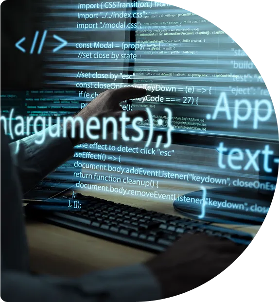 Hands typing code on a keyboard, with source code projected across the screen