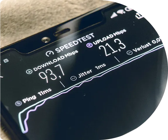 A phone showing a broadband speed test