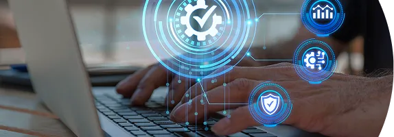 Hands on a laptop with security and reporting icons floating above it